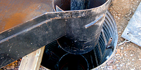 Drilling over an existing municipal water well